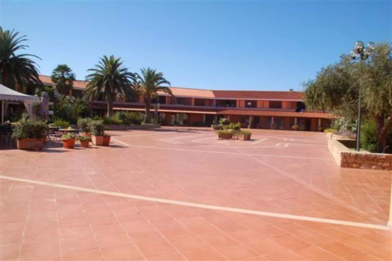Residence Porto Coda Cavallo - APARTMENT 1 BEDROOM - Buitenkant zomer