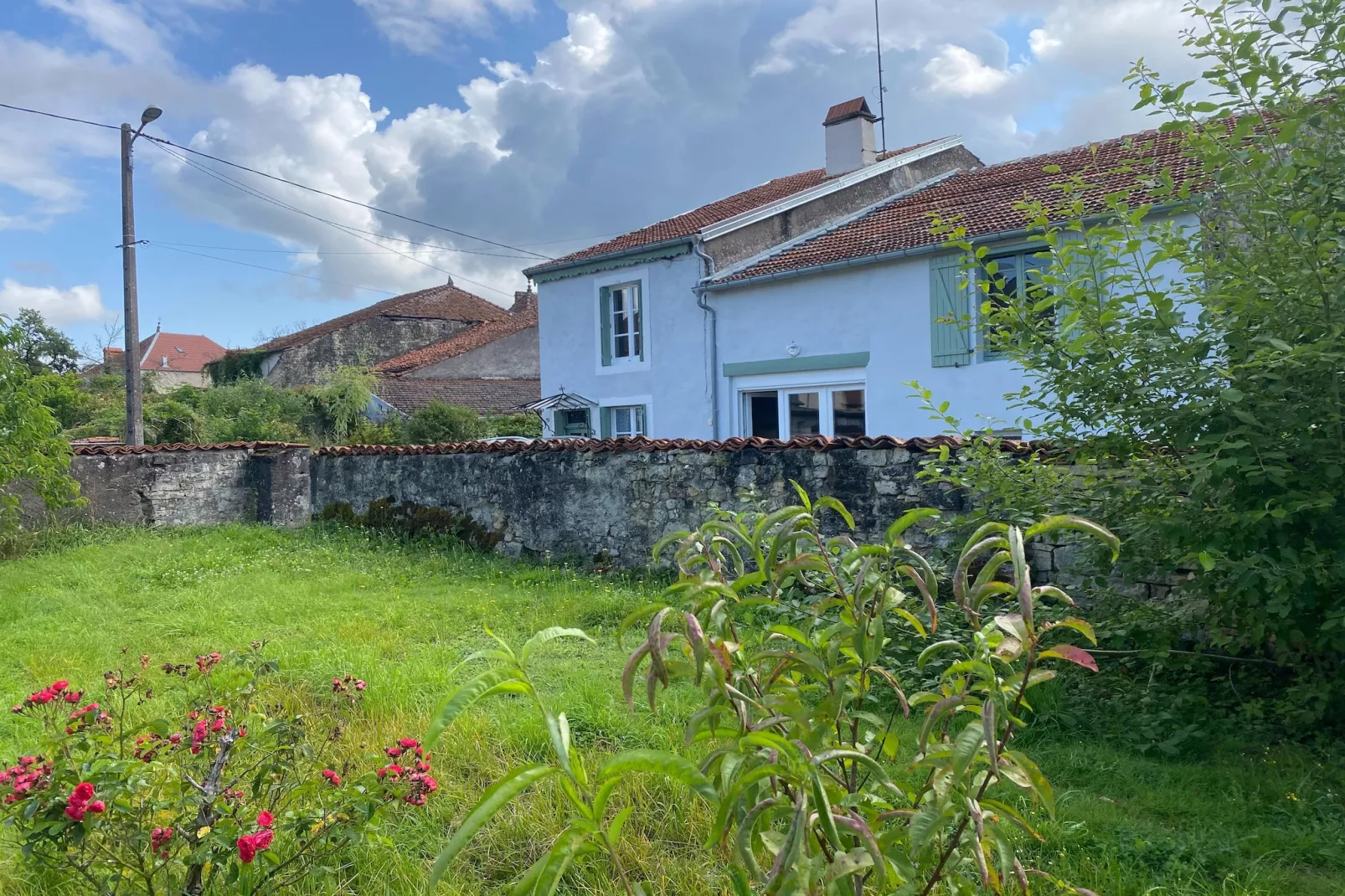 Maison de charme - Buitenkant zomer