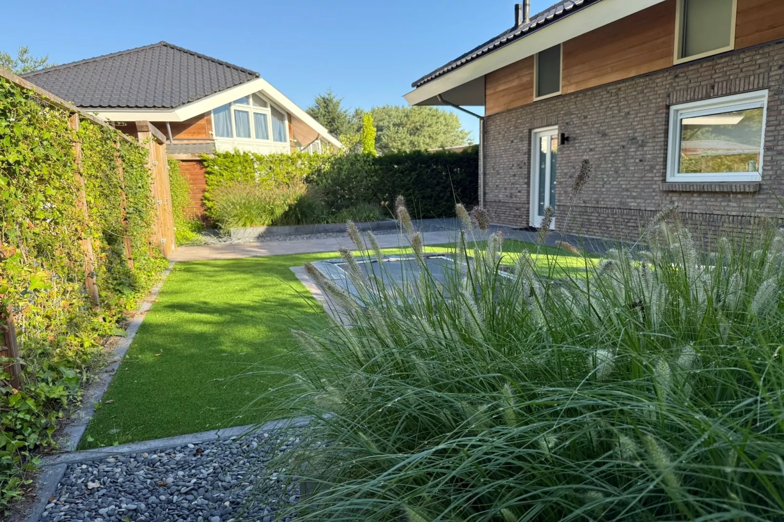 Holiday home Torenvalk - Tuinen zomer