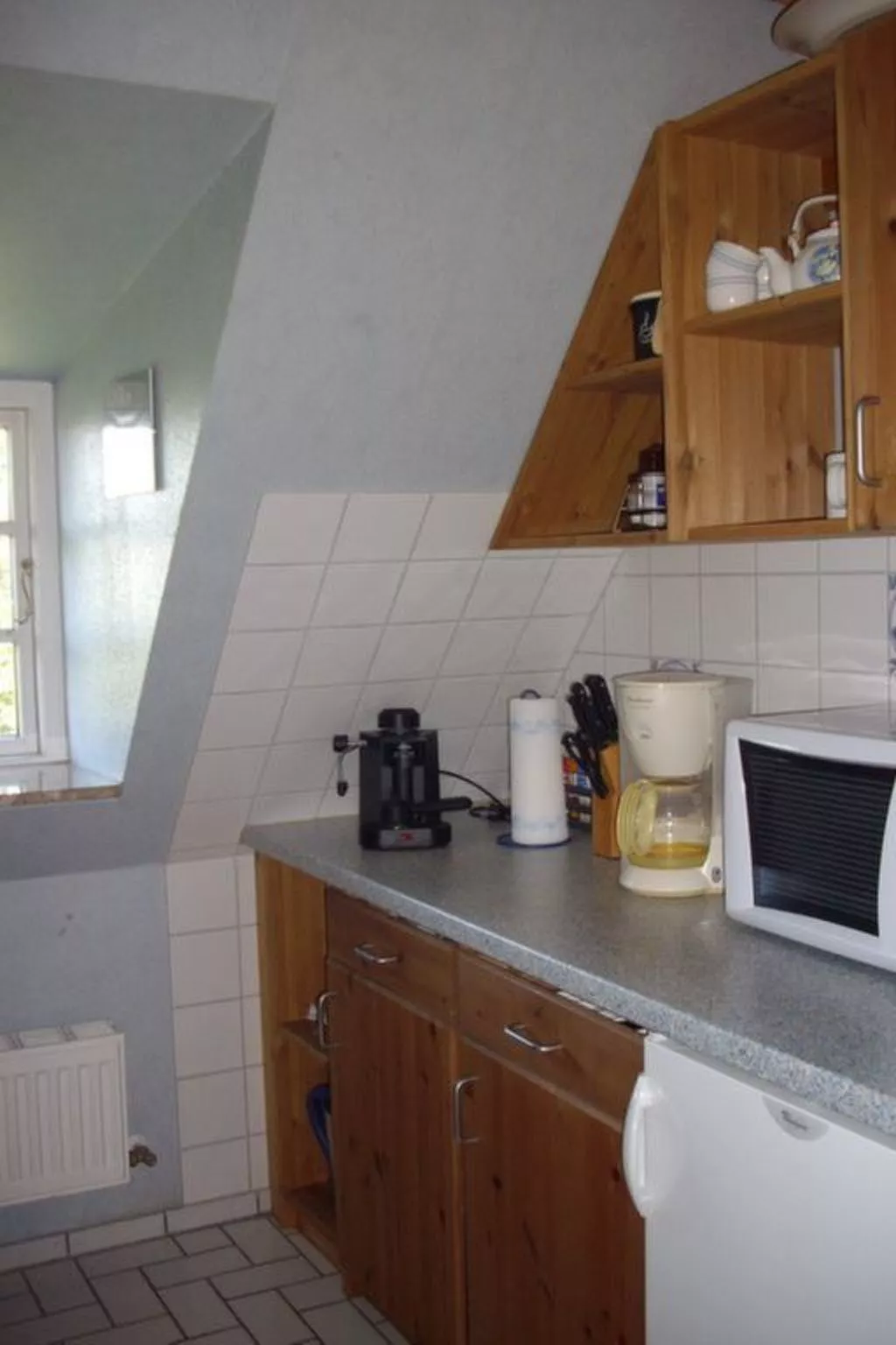 Wohnung in einem reetgedeckten Friesenhaus aus dem Jahr 1860 - Binnen