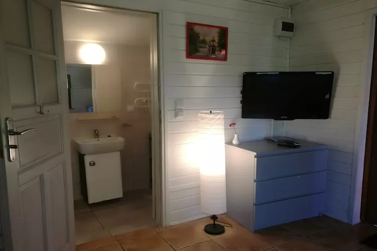 	Domek wakacyjny z 1 sypialnią na piętrze w Kopalinie - Binnen