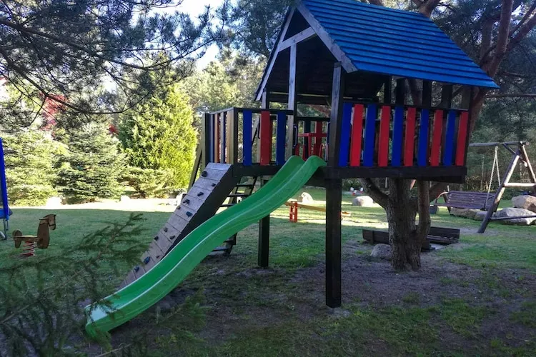 Domek wakacyjny z 2 sypialniami na piętrze w Kopalinie - Tuinen zomer