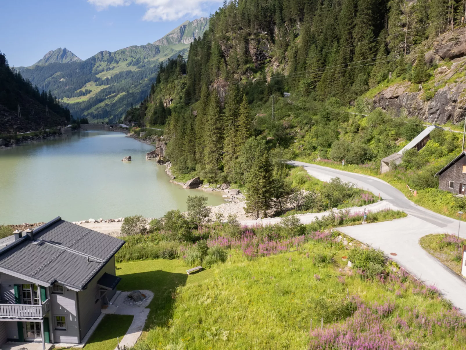 Lodge Seeblick 161 im Tauerndorf Enzingerboden - Buiten
