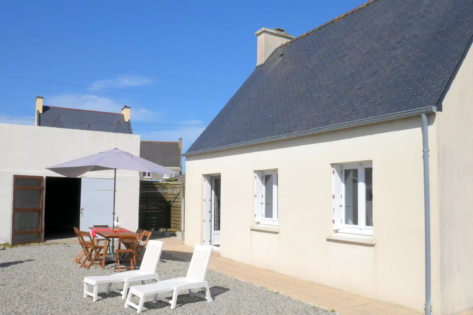 Ferienhaus in Strandnähe Guissény - Buitenkant zomer