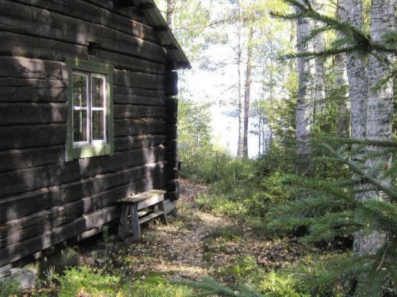 Blockhütte für das wahre Naturerlebnis am See - Buiten