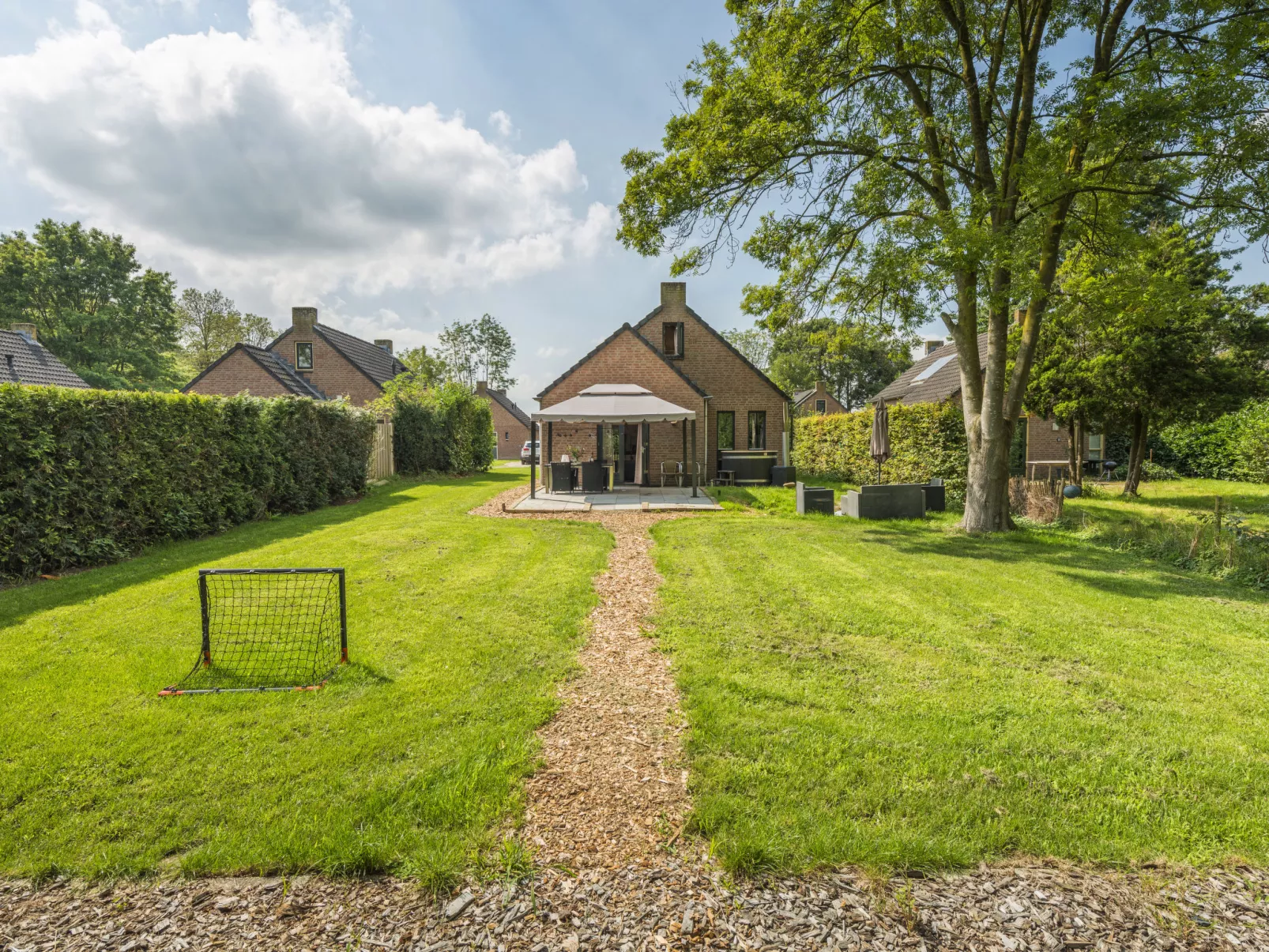 Forest Cottage Ewijk incl. hot tub-Buiten