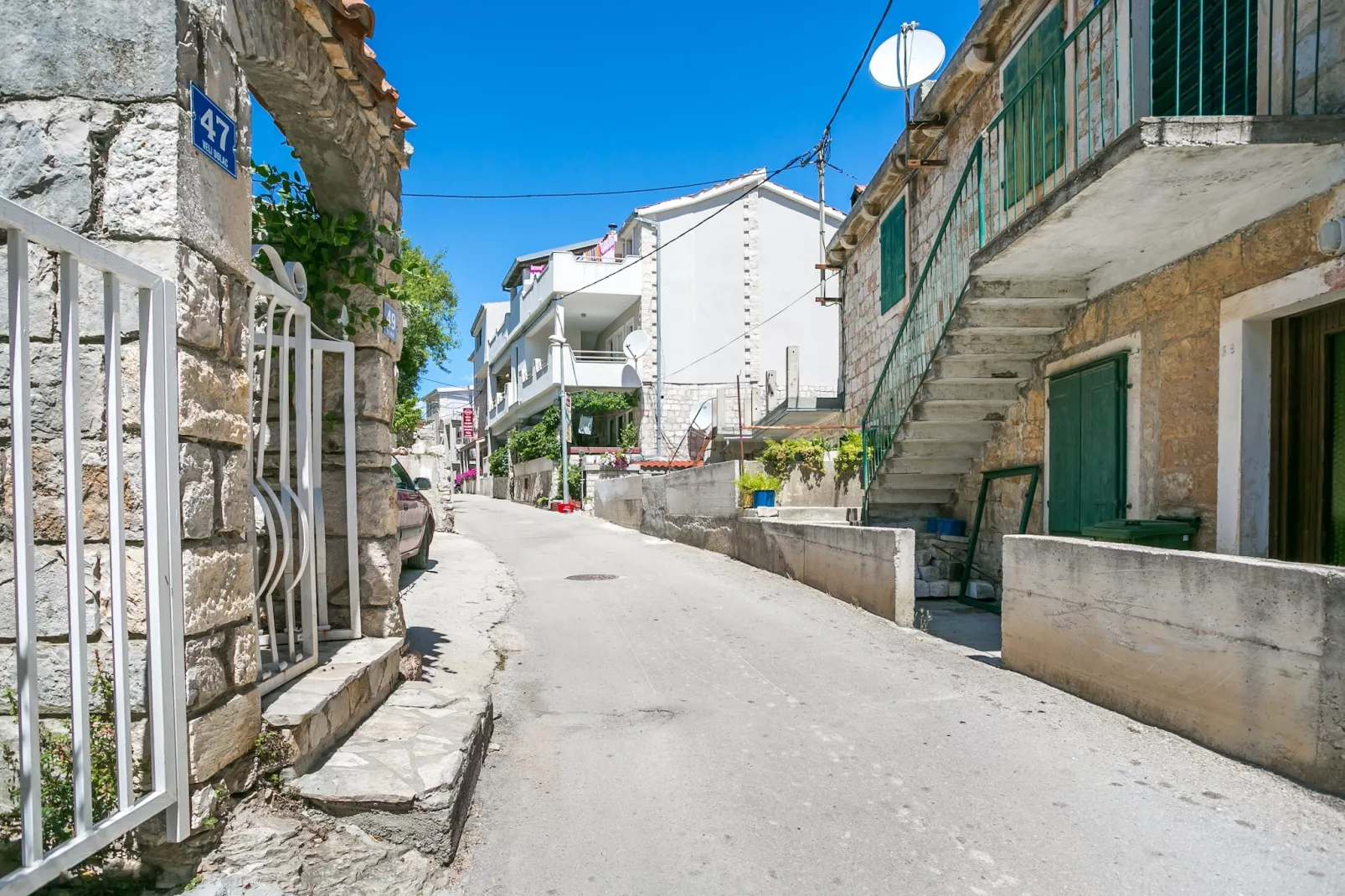Apartmani Sidrana 1 - Buitenkant zomer