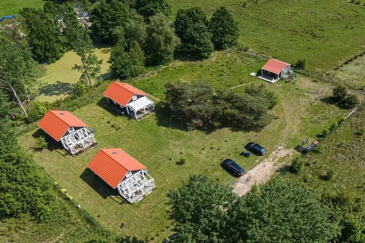 Domki wakacyjne w Słodzińskim Lesie - Buitenkant zomer