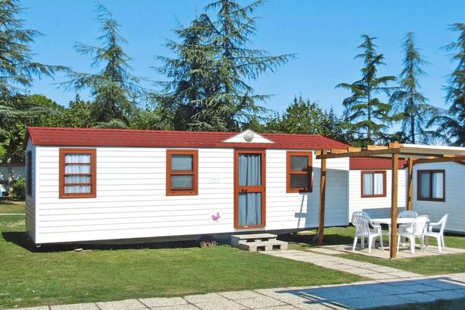 Caravanpark San Benedetto Camping Relais Peschiera / MH 4/5 / Chalet-Buitenkant zomer