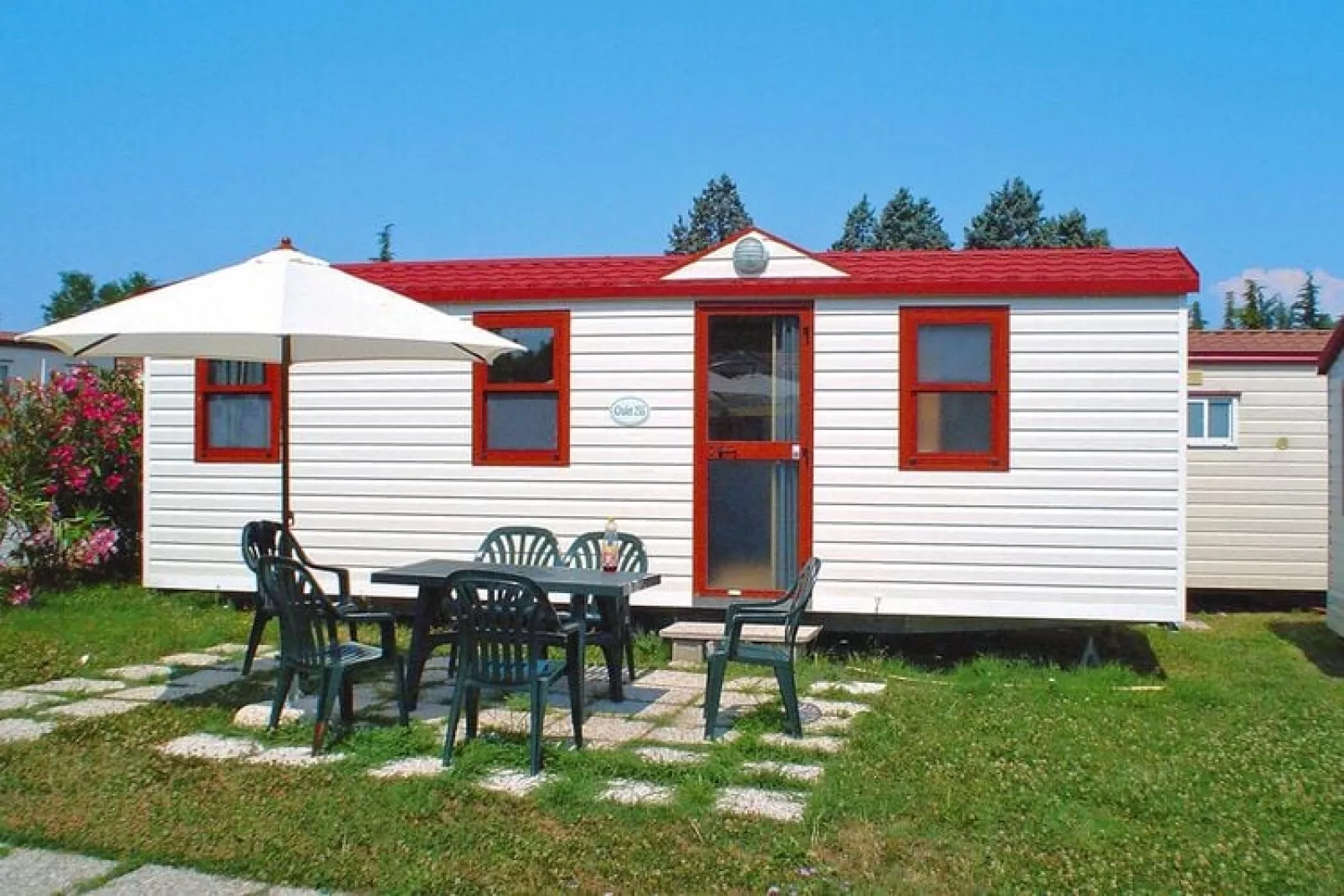 Caravanpark San Benedetto Camping Relais Peschiera / MH 4/5 / Chalet-Tuinen zomer