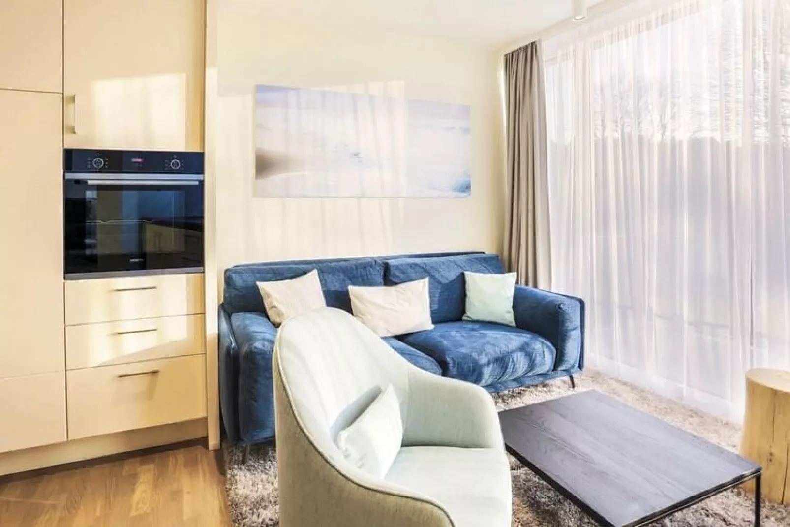 Apartments im MAREMÜRITZ Yachthafen Resort & Spa / Anker Penthouse Suite 4 Personen-Woonkamer