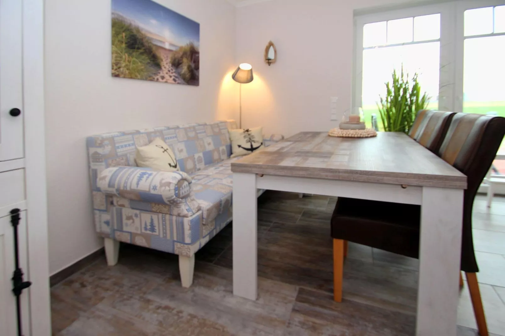 Gemütliche Nordsee-Wohnung in Neßmersiel mit Garten und Feldblick-Woonkamer