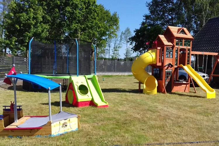 Domki wakacyjne Dąbki-Tuinen zomer