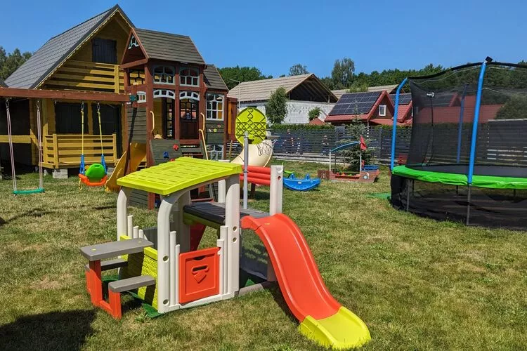 Domki wakacyjne Dąbki-Tuinen zomer