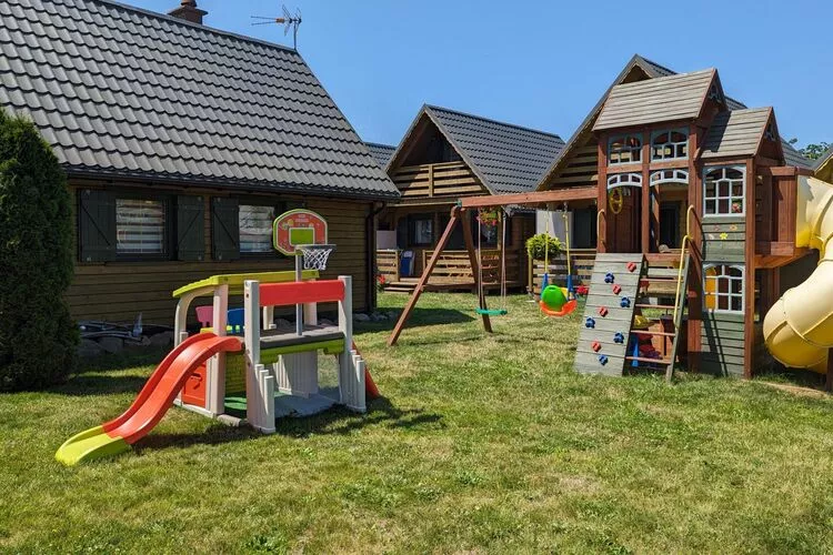 Domki wakacyjne Dąbki-Tuinen zomer