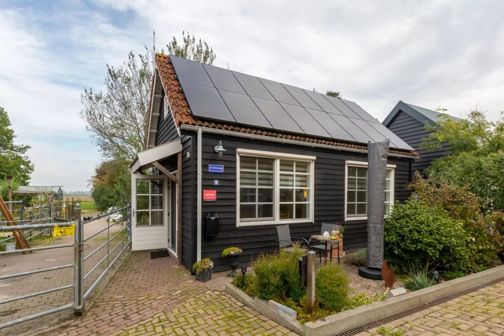 Achterweg 10 l Zonnemaire 'Sol e Mar'-Buitenkant zomer