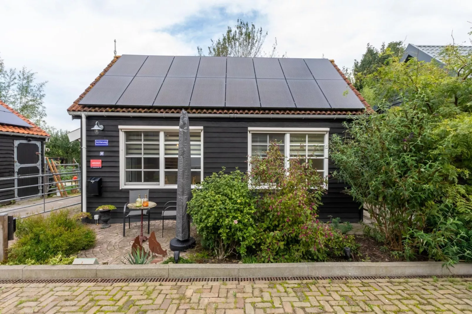 Achterweg 10 l Zonnemaire 'Sol e Mar'-Buitenkant zomer