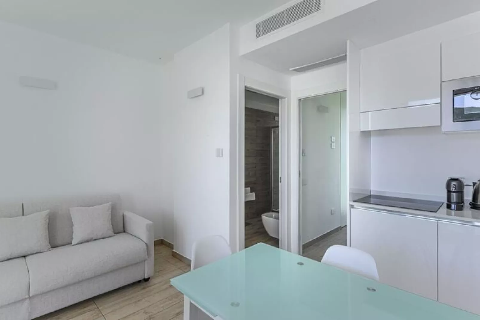 Residence Capo Falcone Stintino "Bilo 4 Comfort"-Woonkamer