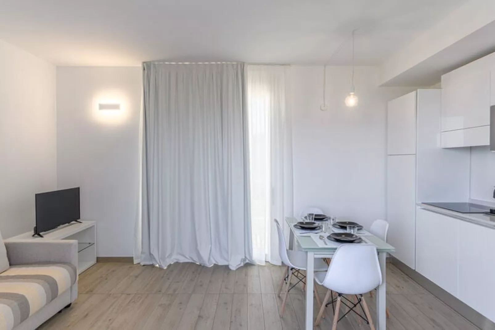 Residence Capo Falcone Stintino "Trilo 6 Premium"-Woonkamer