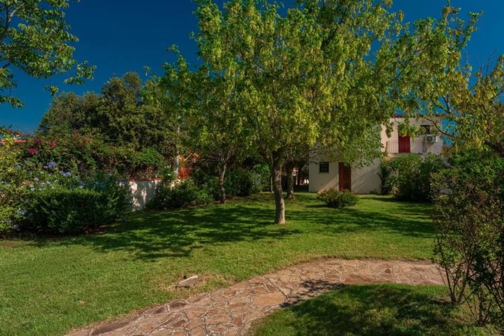 Ferienanlage Budoni-BILO 2 Residence "le Dimore di Budoni-Tuinen zomer
