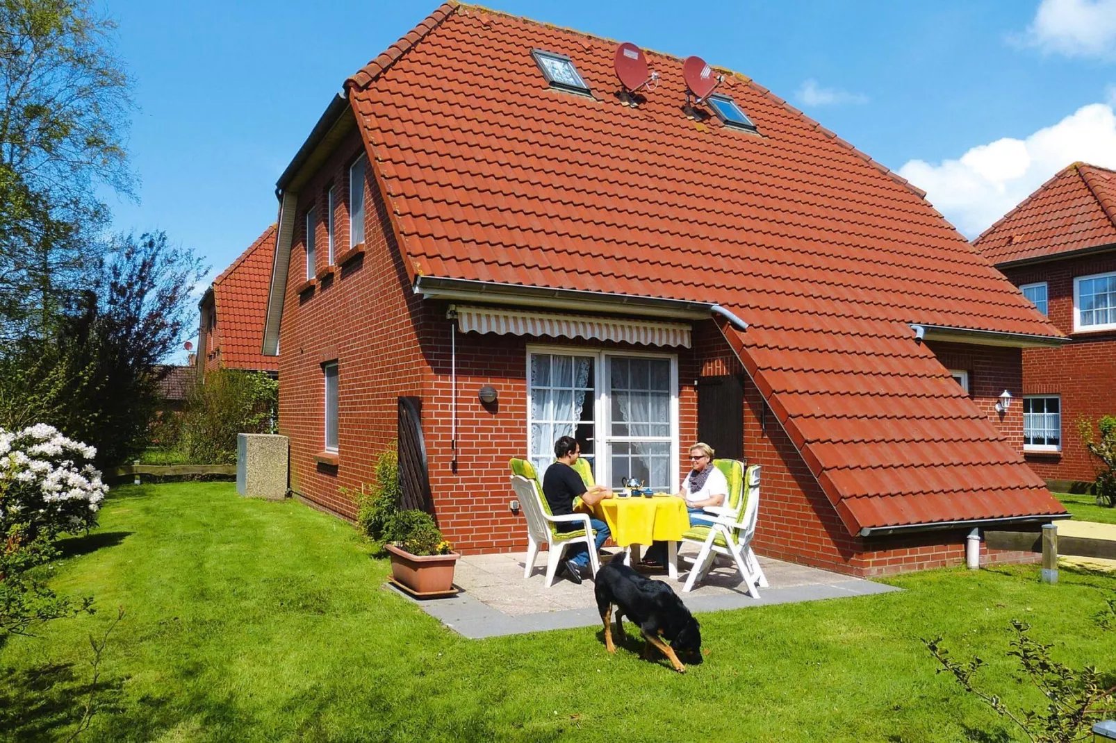 Doppelhaushälfte Neßmersiel-Buitenkant zomer