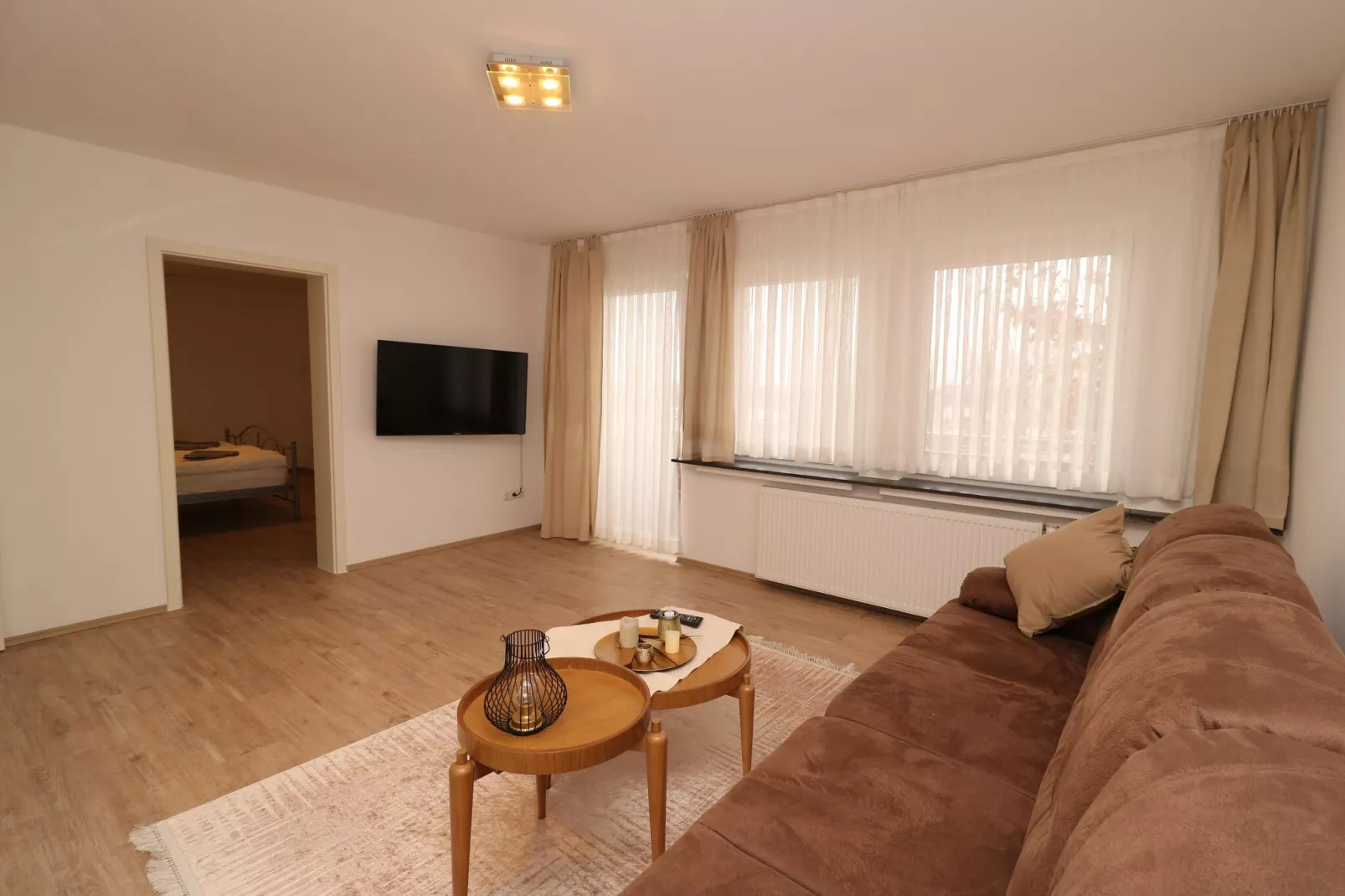 Apartment mit Wasserbett-Woonkamer