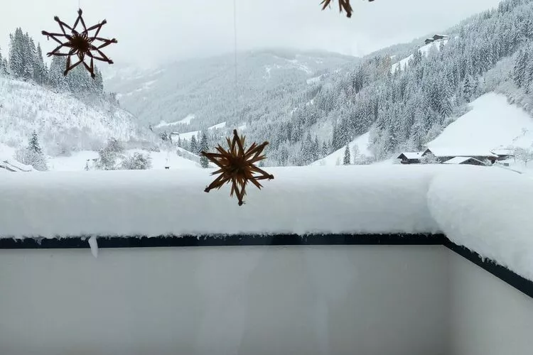 Apartment mit Balkon und wunderschönem Bergblick - 4 Personen-Tuin winter