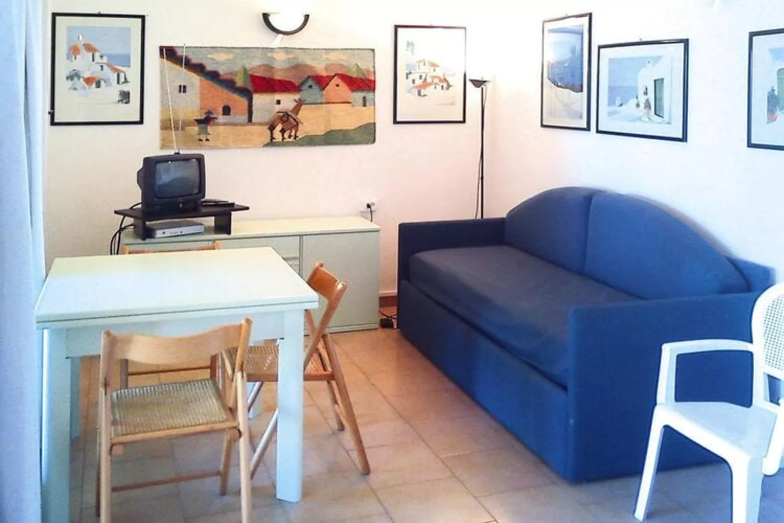 Holiday residence Il Nido dei Gabbiani Porto Pollo / Bilo Comfort 4 pax anche per disabile-Woonkamer