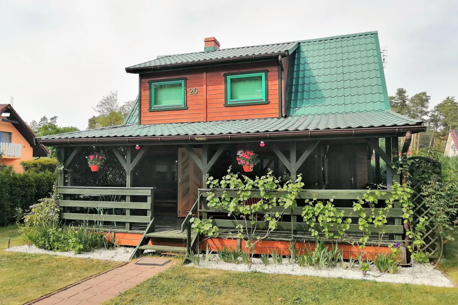 Dom wakacyjny w Morzyczynie nad jeziorem dla 5 osób-Buitenkant zomer