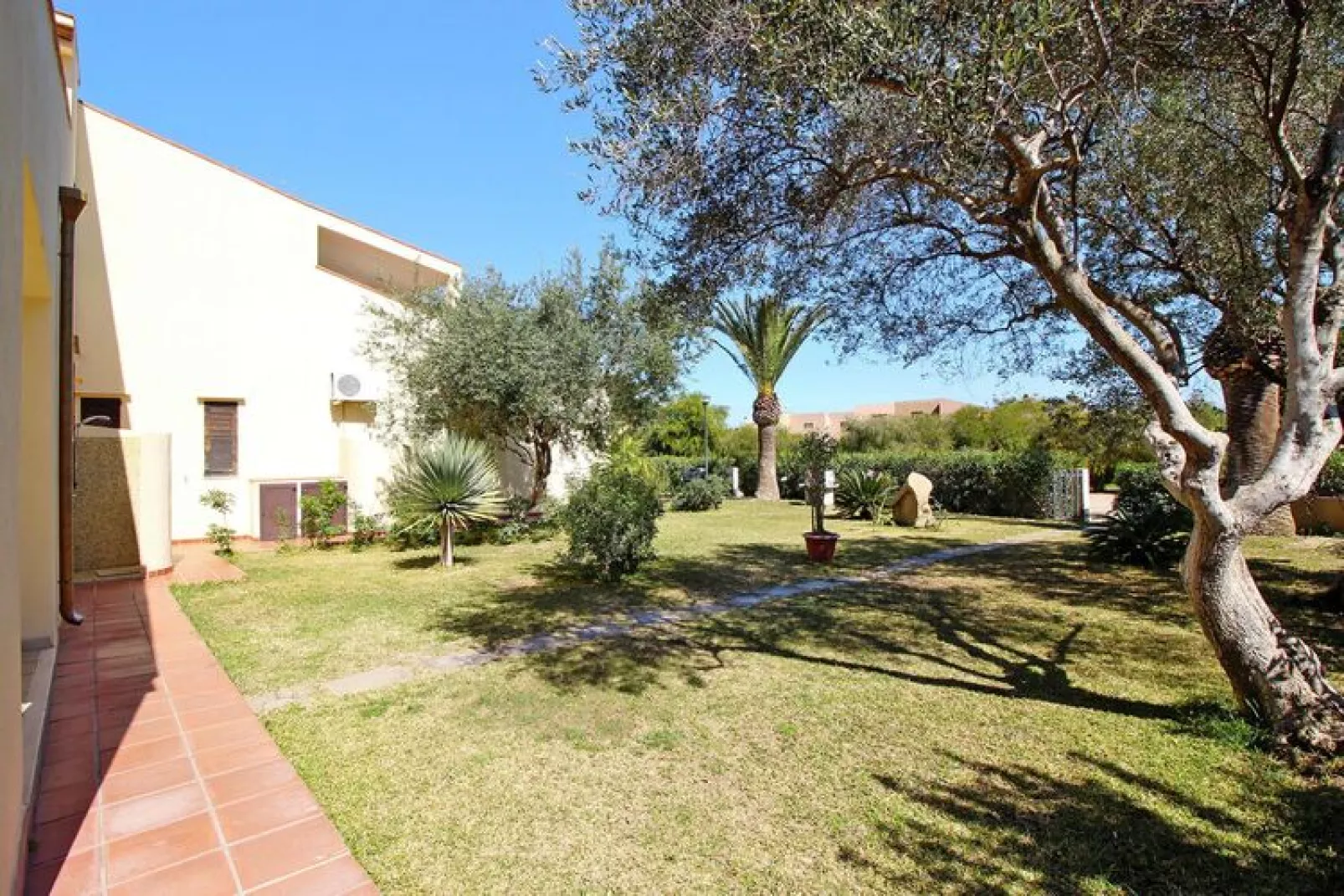 Ferienresidence Villaggio Turagri Costa Rei Trilo - Type Trilo-Tuinen zomer