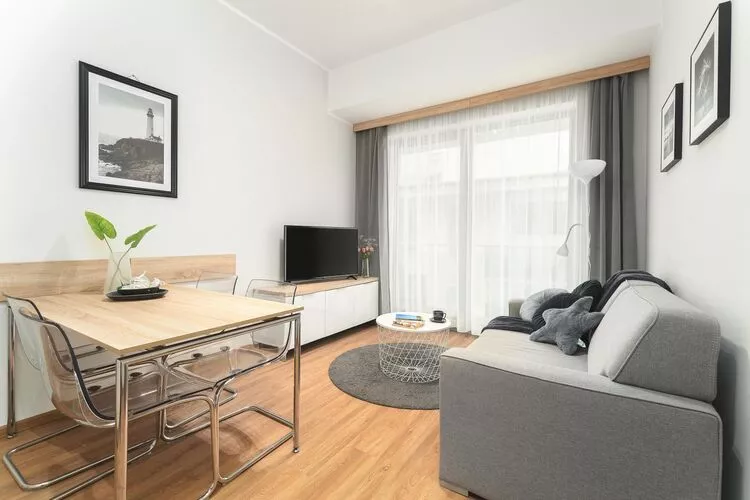 Apartament dla 4 osób Grunwaldzka 12c23 Pobierowo-Woonkamer