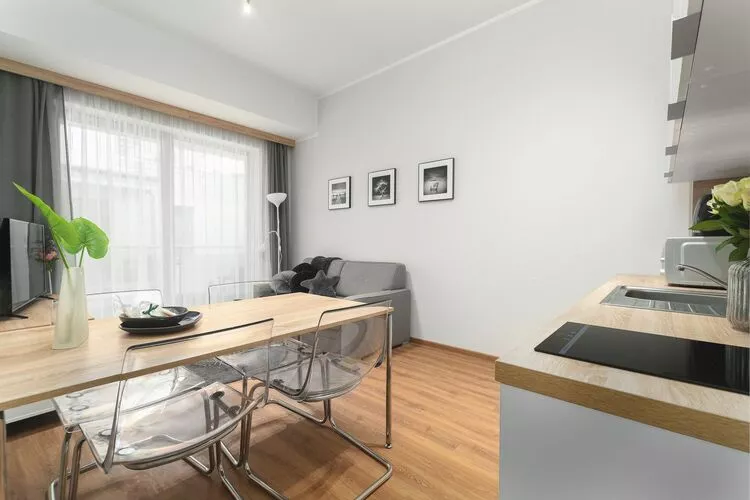 Apartament dla 4 osób Grunwaldzka 12c23 Pobierowo-Woonkamer