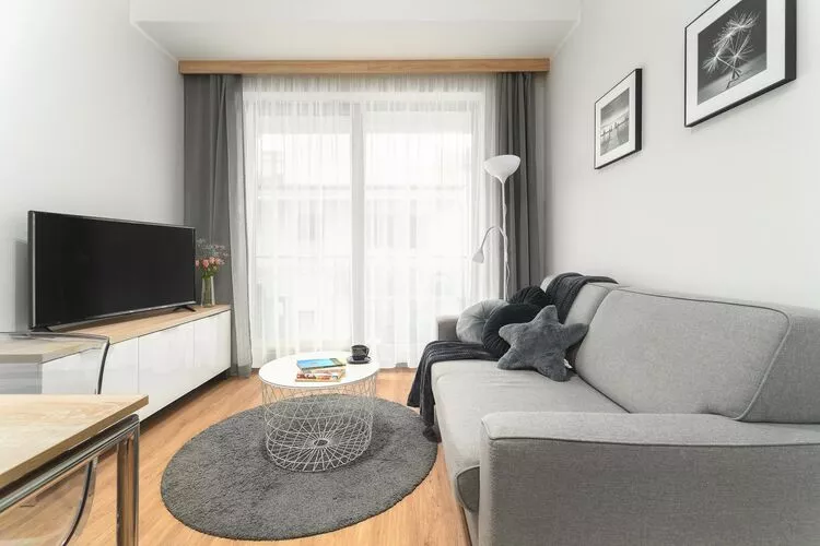 Apartament dla 4 osób Grunwaldzka 12c23 Pobierowo-Woonkamer