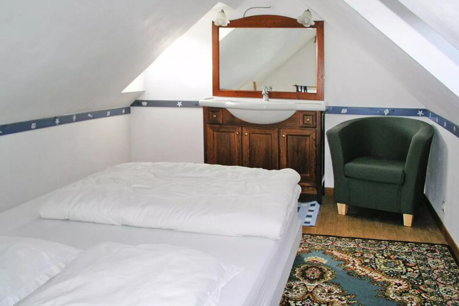 Steinhaus mit Meerblick auf der Insel Ouessant-Slaapkamer