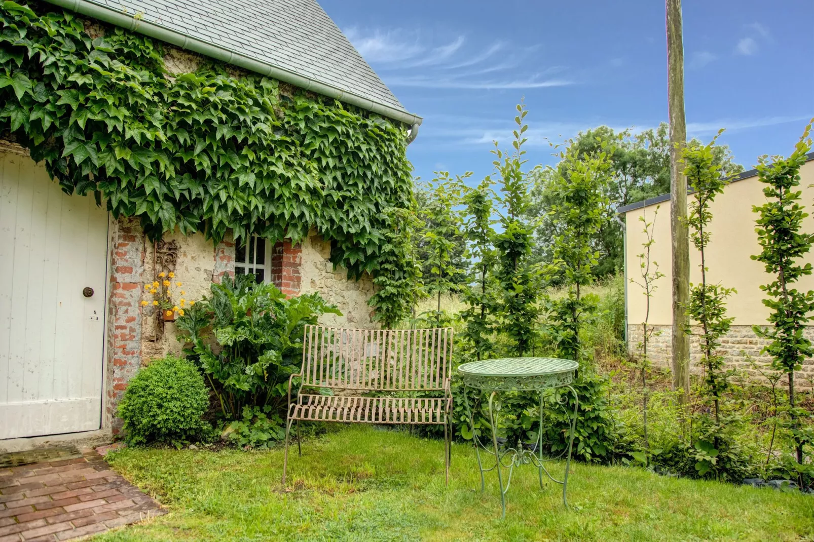 Vakantiehuis in Houtteville met tuin-Buitenkant zomer