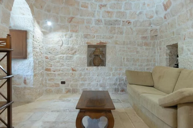 Ferienhaus Cisternino - Type Trulli Contrada Barbagiulo-Woonkamer