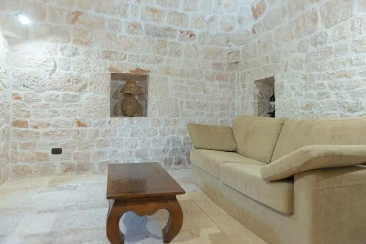 Ferienhaus Cisternino - Type Trulli Contrada Barbagiulo-Woonkamer