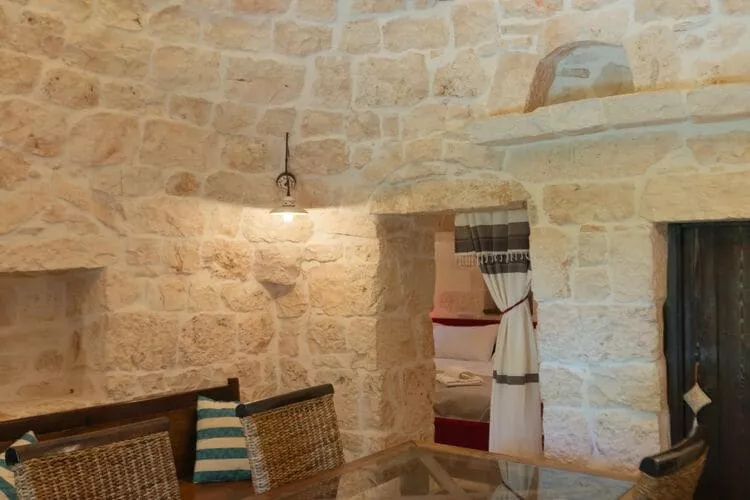 Ferienhaus Cisternino - Type Trulli Contrada Barbagiulo-Woonkamer