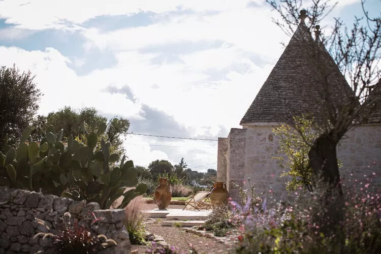 Trulli Petralux in Valle d'Itria-Tuinen zomer