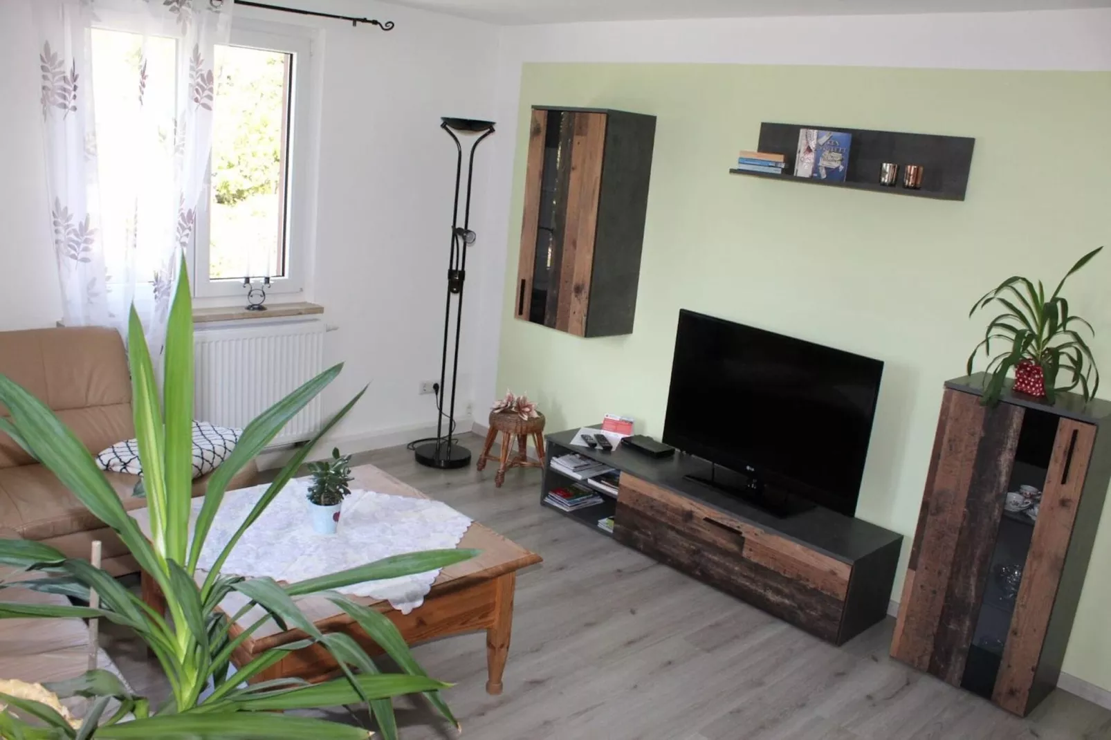 Robert's Ferienwohnung-Woonkamer