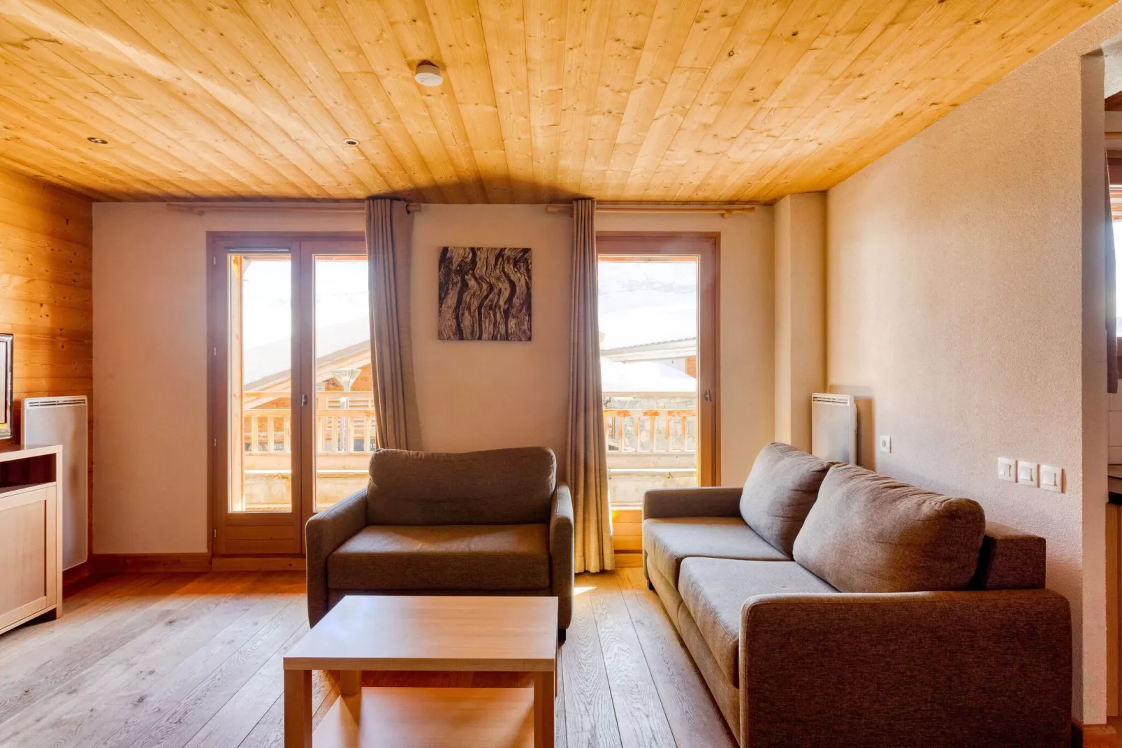 Authentiek appartement in het skigebied Le Grand Massif-Woonkamer