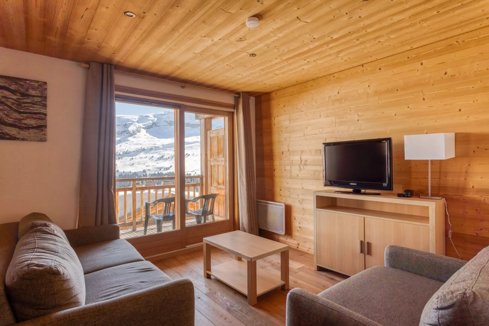 Authentiek appartement in het skigebied Le Grand Massif-Woonkamer