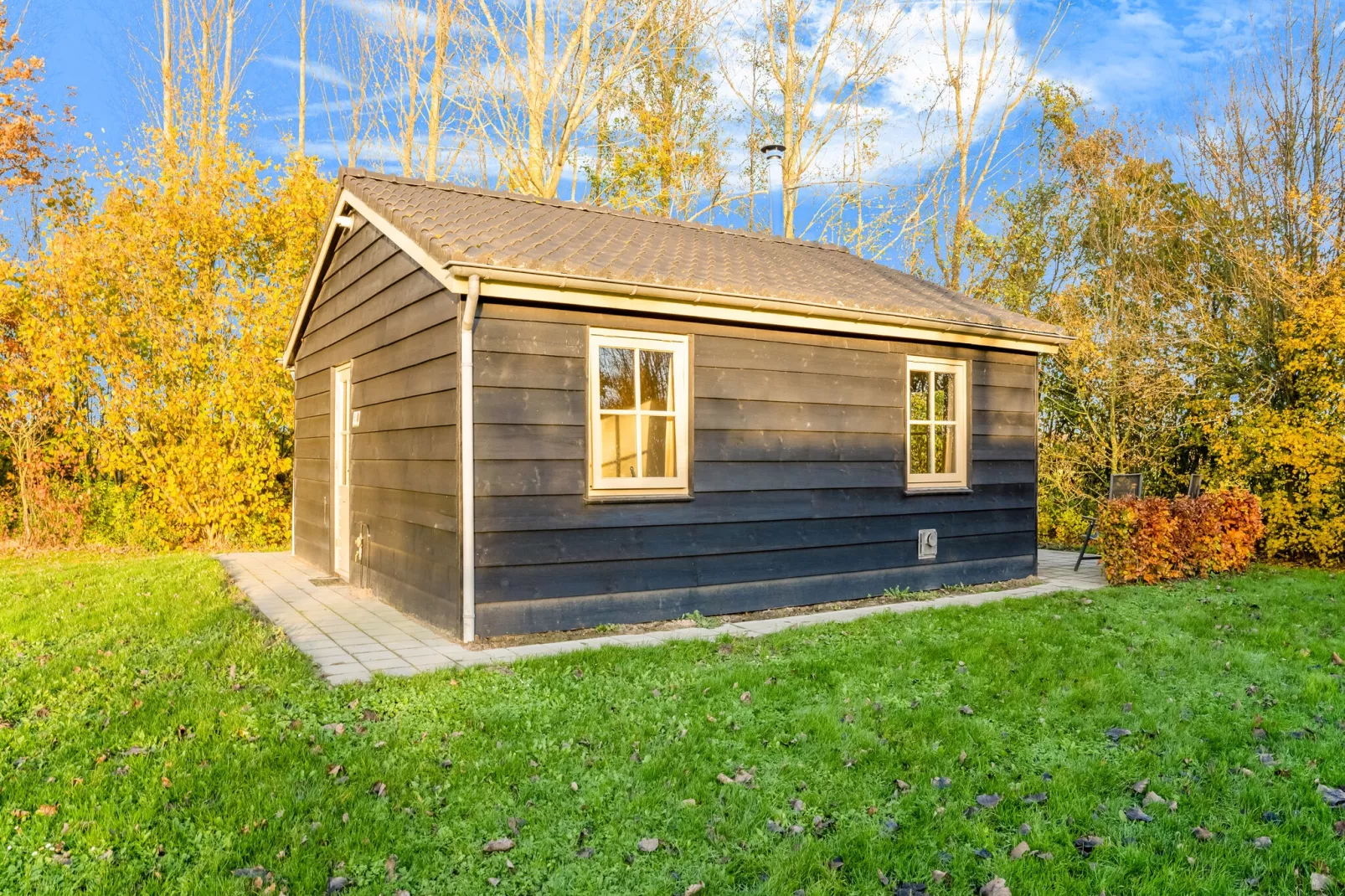 Vakantiehuisje 5 Aarde Groene Camping Lage Zwaluwe-Buitenkant zomer