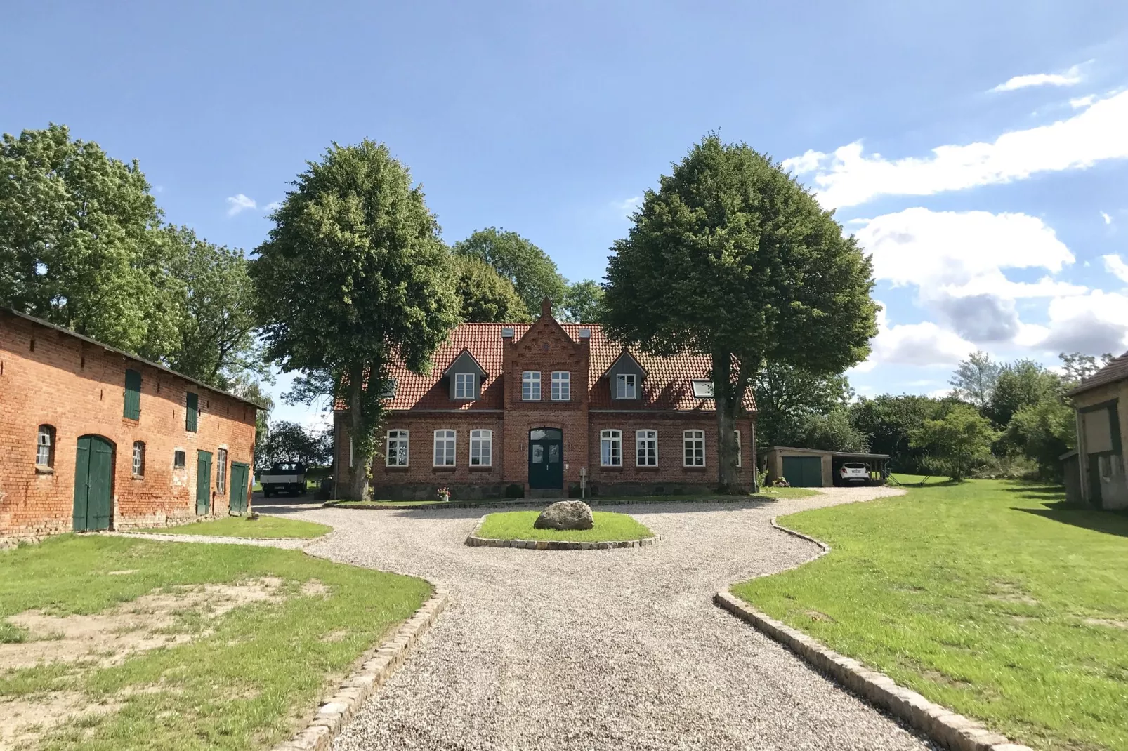 Ferienhaus Im Gutshofpark mit Sauna-Uitzicht zomer
