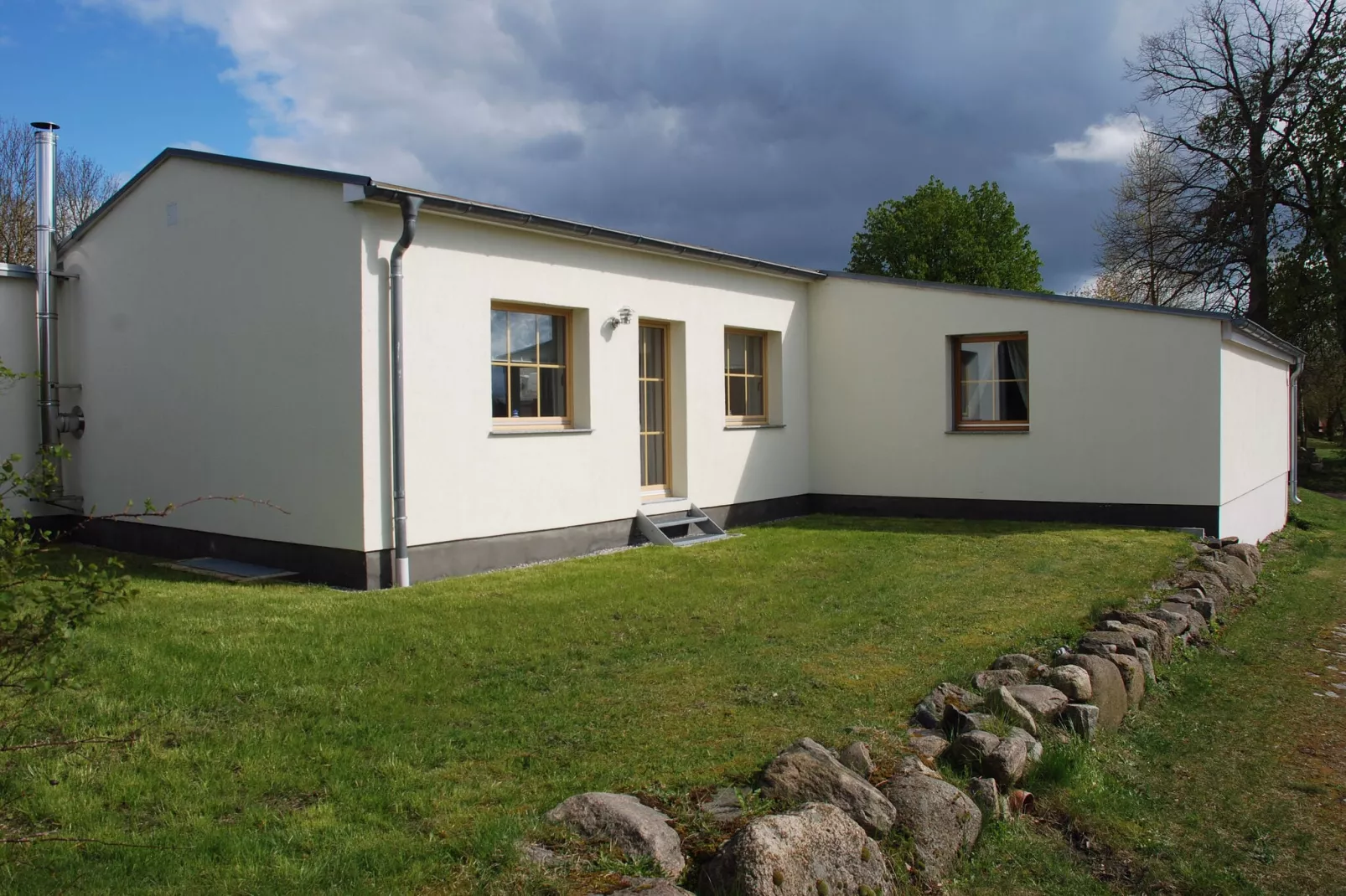 Ferienhaus Im Gutshofpark mit Sauna-Buitenkant zomer