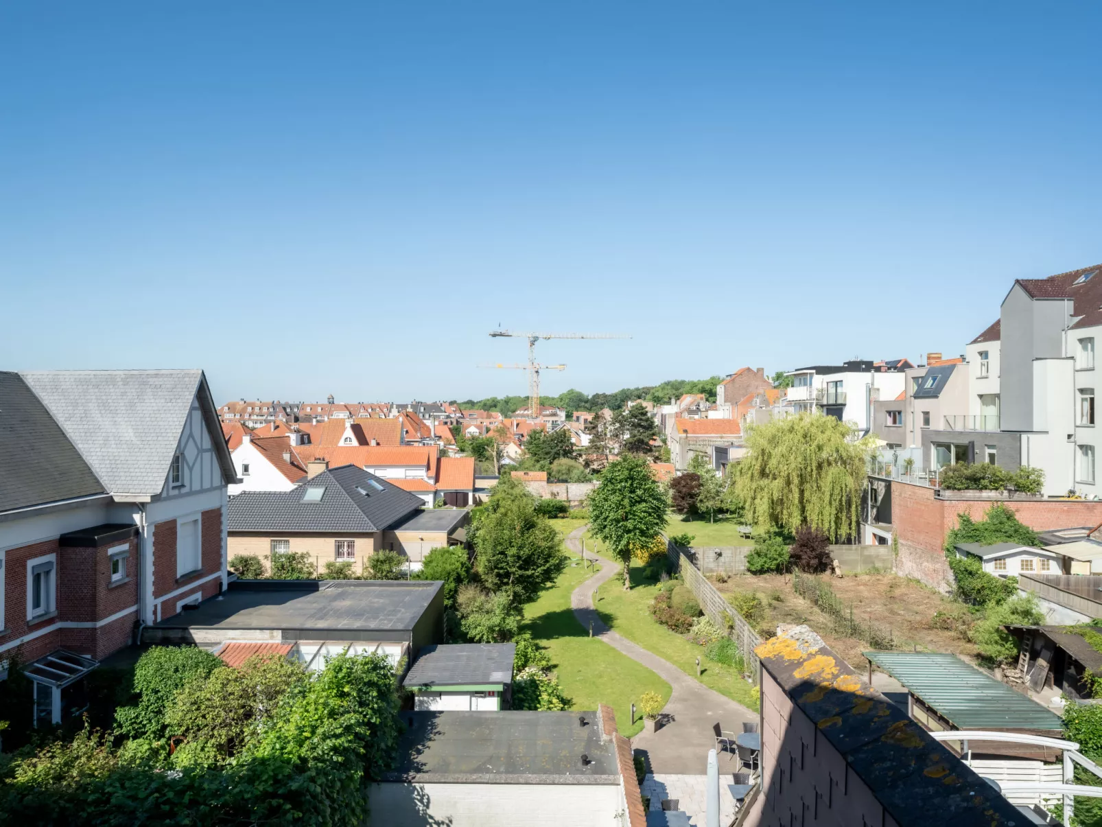 Le Coeur du Coq duplex appartment-Buiten