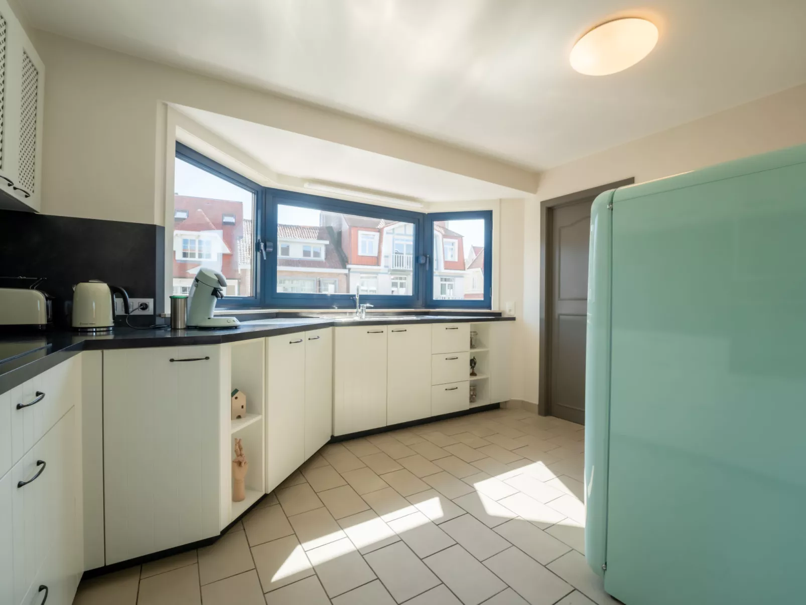 Le Coeur du Coq duplex appartment-Binnen