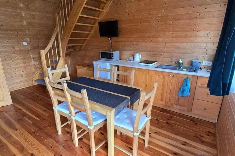 Domki wakacyjne STANDARD dla 4 osób Sarbinowo-Woonkamer