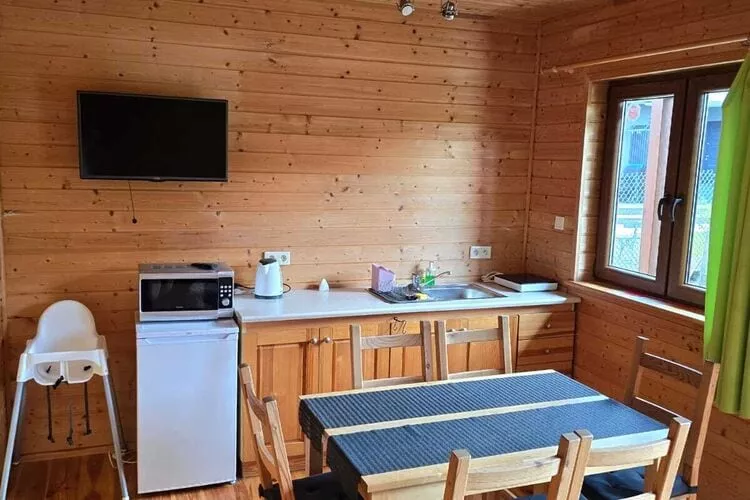 Domki wakacyjne STANDARD dla 6 osób Sarbinowo-Woonkamer