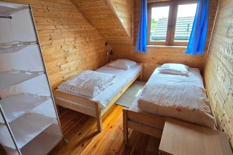 Domki wakacyjne STANDARD dla 6 osób Sarbinowo-Slaapkamer